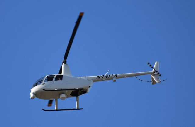 Robinson R-44 (N441TX) - Circling overhead covering a local news story.