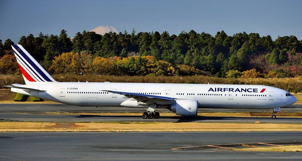 BOEING 777-300 (F-GZNS) - Landing, Fuji San behind...