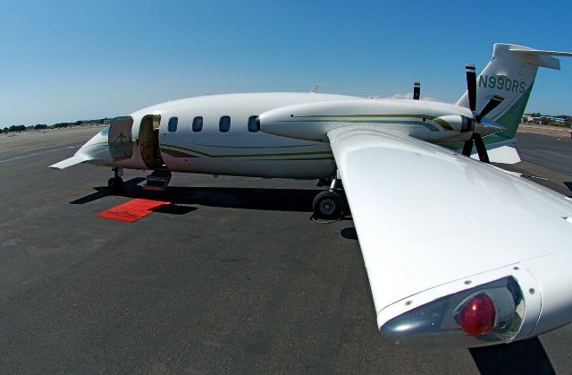 Piaggio P.180 Avanti (N990RS) - White with green stripes. serial # 1015