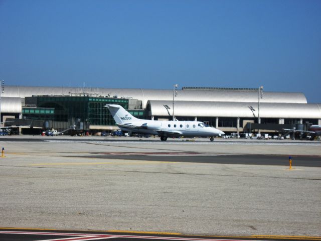 Beechcraft Beechjet (N63XP) - Line up and wait on RWY 19R