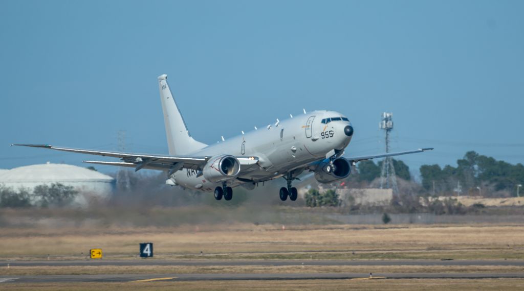 16-7955 — - A Navy P-8A Poseidon conducts some pattern work at Ellington Field on January 19, 2021