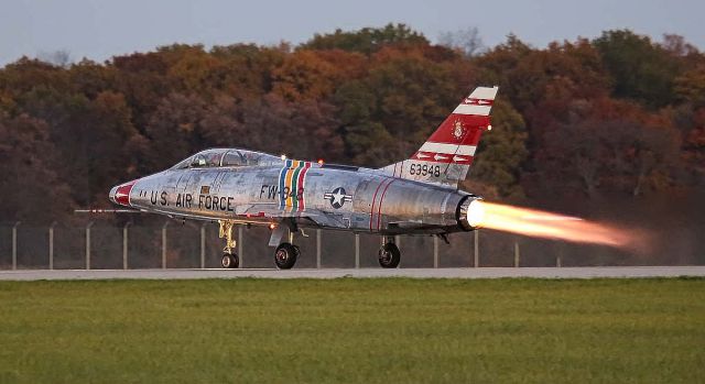 North American Super Sabre (N2011V) - Taking off at dusk from KFWA