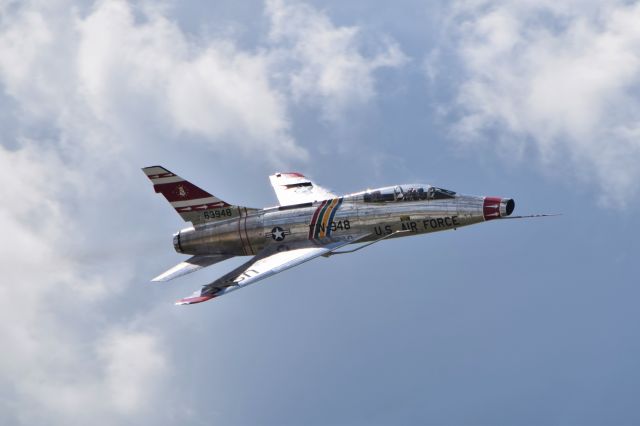 North American Super Sabre (N2011V) - Photo pass by F-100 Super Sabre at the Fort Wayne Air Show on September 11, 2016. Notice clean configuration, as this rare bird is at it's home field and external tanks were not needed.