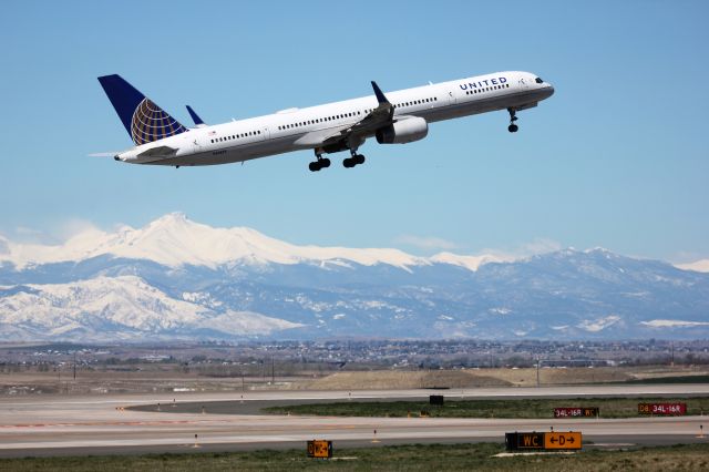 BOEING 757-300 (N56859) - Departing from 34L on 4-30-17 to Las Vegas. Longs Peak in the background.