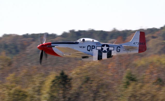 North American P-51 Mustang (L10601) - A CAF Dixie Wing P-51 makes a high speed pass over runway 13 at Falcon Field.