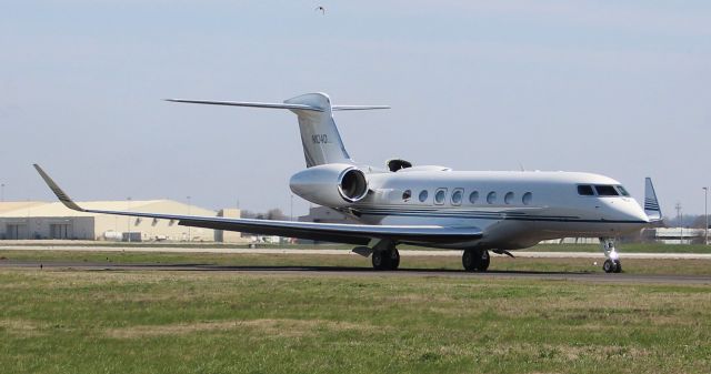 Gulfstream Aerospace Gulfstream G650 (N1040) - A Gulfstream Aerospace GVI (G650ER) taxiiing for takeoff at Carl T. Jones Field, Huntsville International Airport, AL - March 13, 2018. Photographed outside Gate 19 along the east taxiway fence along Boeing Circle.
