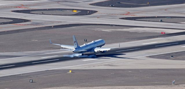 Boeing 757-200 (09-0016) - 09-0016, a VC-32A (military variant of a B752) operating as Air Force One because President Trump is aboard, touches down on Reno Tahoe International's Runway 34L. President Trump was arriving at RNO to take a motorcade to KCXP, the airport in Nevada's capitol in Carson City, to attend a campaign rally.