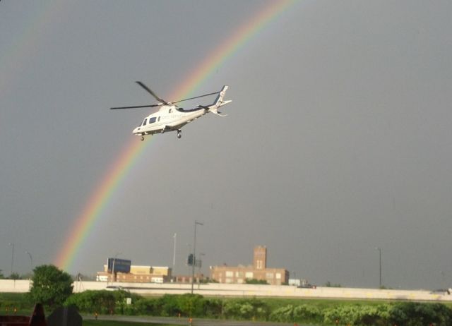 SABCA A-109 (N10NM) - Somewhere over a rainbow goes N10NM after leaving Regions Hospital, St. Paul, MN