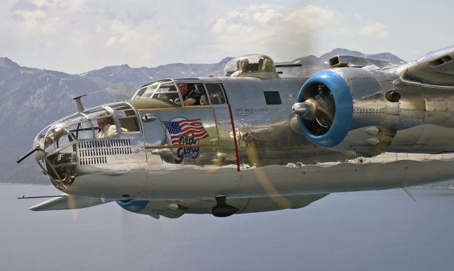 North American TB-25 Mitchell (N7946C) - Taigh Ramey flying John Wards North American B-25J Mitchell bomber Old Glory high above Lake Tahoe somewhere between California and Nevada.