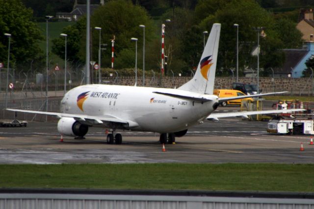 BOEING 737-400 (G-JMCY) - Parked on Stand 205 on 6-May-19.