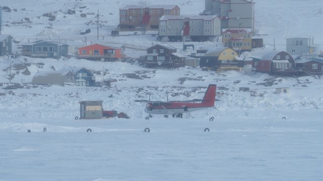 De Havilland Canada Twin Otter (C-GKBO) - Emergency landing....C-GKBO, a twin otter owned by Kenn Borek Air had to land on the sea ice about a minute after it took off from the Iqaluit airport.br /The tires on the sea ice demark a weekend race course for snowmobiles. :) It was blowing snow at ground level - not the clearest of days. March 9, 2022