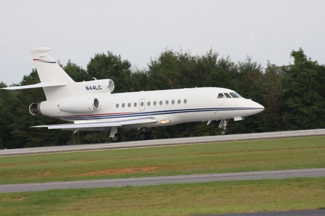 Dassault Falcon 50 (N44LC) - This Falcon dropped in on a Friday night.  It been a busy night in Gainesville, GA.  Having just landed the reverse thrusters are engaged.