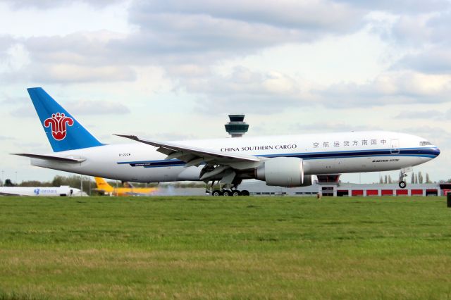 BOEING 777-200LR (B-222W) - Touching down on rwy 22 on 11-Apr-24 operating flight CSG2531 from ZGGG.