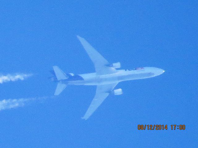 Boeing MD-11 (N580FE) - FedEx flight 568 from MEM to SEA over Baxter Springs KS (78KS) at 36k feet.