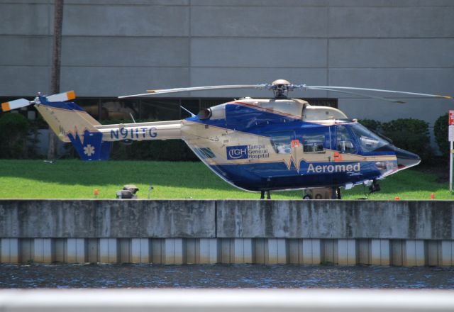 NUSANTARA NBK-117 (N911TG) - FLORIDA HEALTH SCIENCES INC DBA on the pad at Tampa General Hospital - 7/26/14