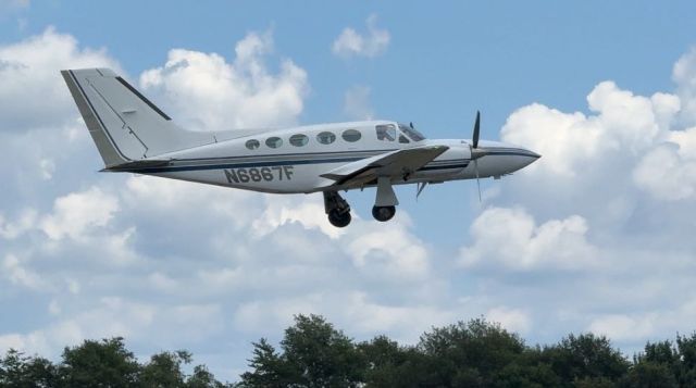Cessna 421 (N6867F) - Cessna 421 shortly after takeoff from Runway 19 at Greenville Downtown Airport from the Runway Park view. br /br /Photo Credit: @AVNATION999