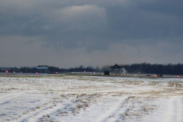 McDonnell Douglas F-15 Eagle (AFR881698) - Looking down the 8500 ft Runway 18 at Austin Straubel.  On a cold snowy November 14th.br /br /A 334th Fighter Squadron F-15E from Seymour Johnson AFB NC is airborne.