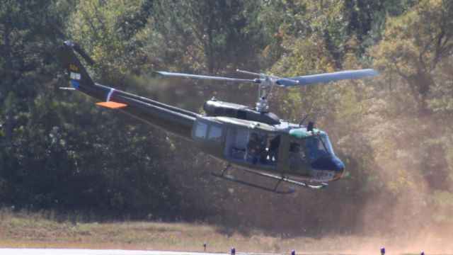 Bell UH-1V Iroquois (N624HF) - Picking up some dust during the Attack Helicopter demo at the Atlanta Air Show 2023.