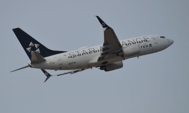 Boeing 737-700 (N13720) - Star Alliance blasting off of Bradley Airports Runway 6.