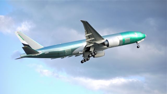 Boeing 777-200 (A6-EFI) - BOE036 makes a missed approach over runway 16R during its maiden flight on 11/7/12. (LN:1060 c/n 35609).