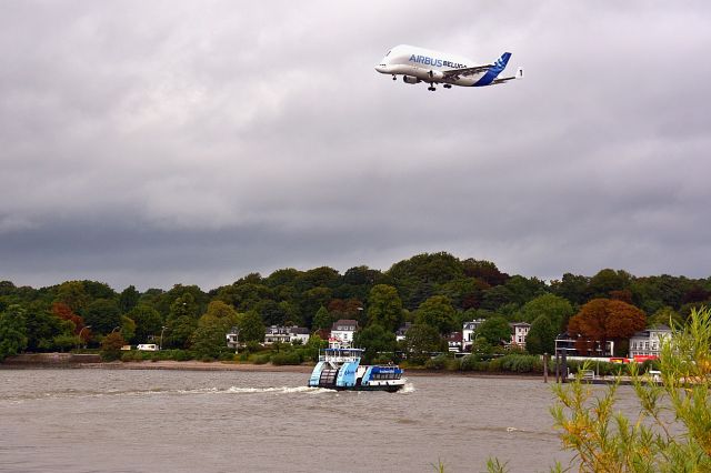 F-GSTA — - If You like aircrafts and vessels, you should go to Hamburg... br /Here you see the Airbus Beluga No.1 over the Elbe river.  (09/06/2017)
