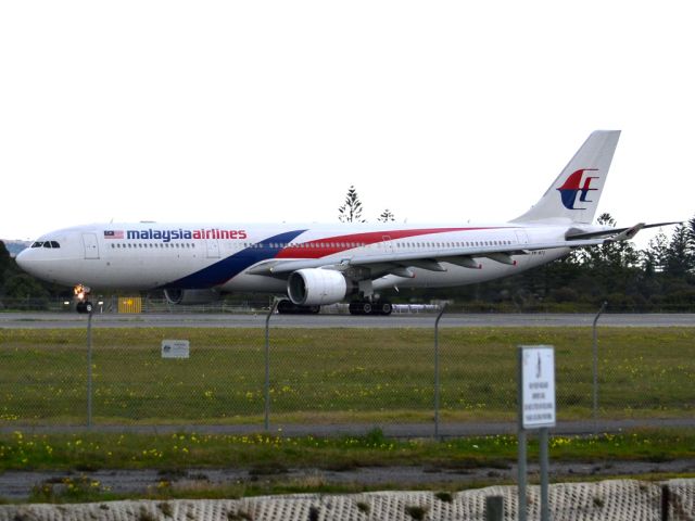 Airbus A330-300 (9M-MTC) - Rolling for take off on runway 05, for flight home to Kuala Lumpur, just before the arrival of a rain storm. Thursday 12th July 2012.