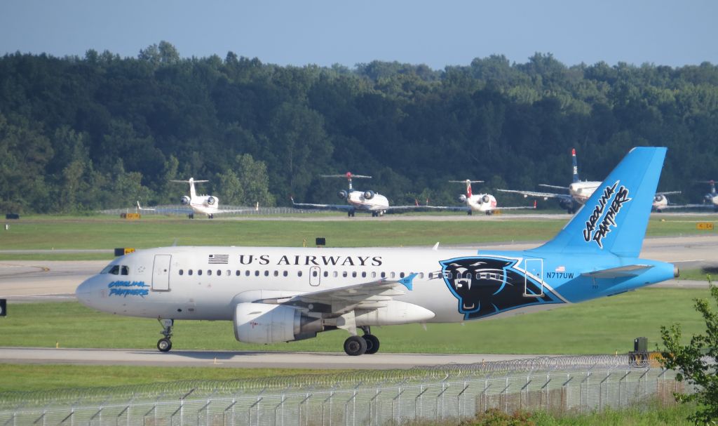 Airbus A319 (N717UW) - July 15, 2013 6:38pm arriving.