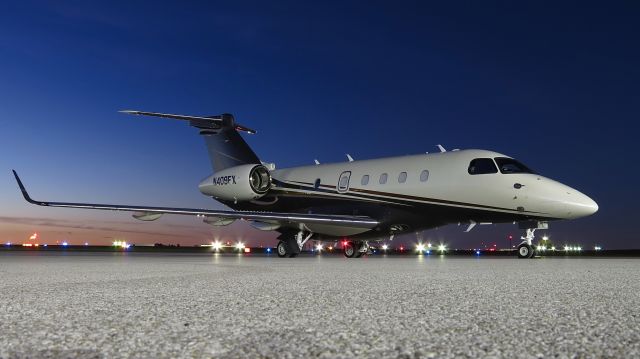 Embraer Legacy 450 (LXJ409) - 409 resting on the ramp before heading out to Augusta. 