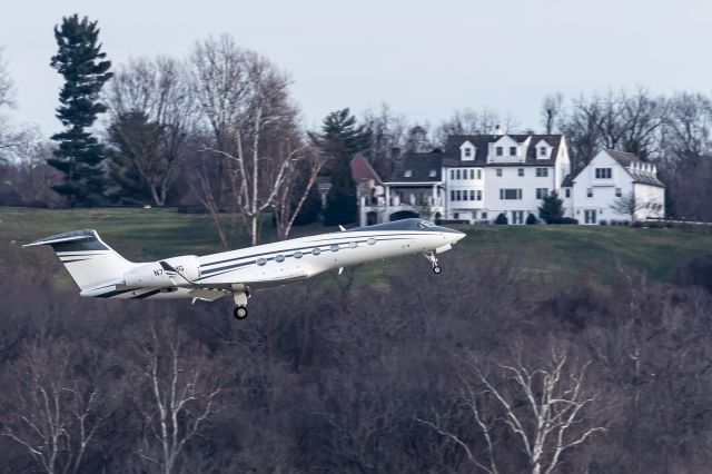 Gulfstream Aerospace Gulfstream V (N793MG) - Slick G-V departing 21L with a beautiful hilltop home poised in the background.