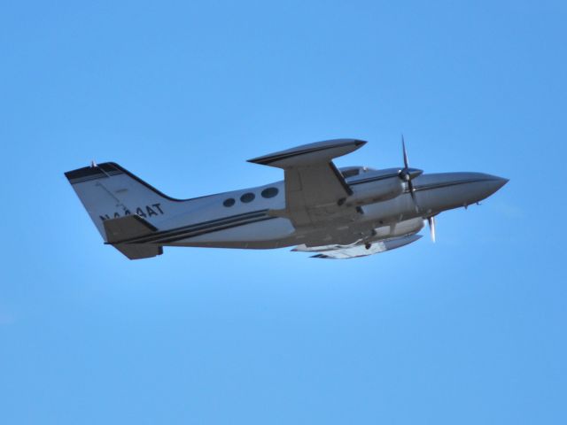 Cessna 421 (N444AT) - CORE AVIATION LLC departing runway 20 at KJQF - 1/20/13