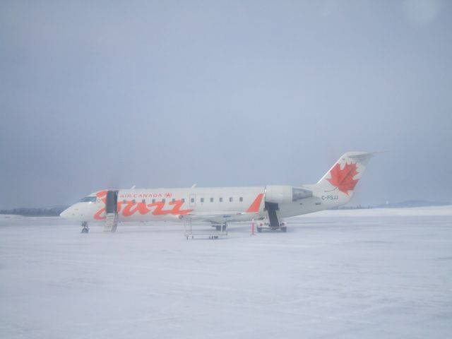 Canadair Regional Jet CRJ-200 (C-FSJJ) - CRJ Parked at Terminal Goose Airport NL. March 13/09