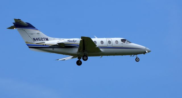 Beechcraft Beechjet (N452TM) - On final is this 2008 Hawker Beechcraft Beechjet 400XP in the Summer of 2019.