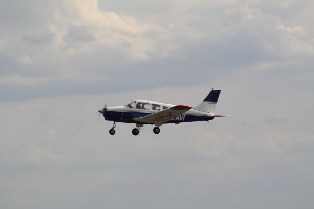 Piper Cherokee (G-XAVI) - A Freedom Aviation Piper PA-28-161 flying over Cotswold Kemble Airport.br /br /br /A Boeing B52 Stratofortress flying over Cotswold Kemble Airport.br /br /Location: Cotsawold Kemble Airport.br /Date: 31.08.22 (dd/mm/yy).