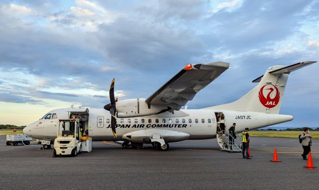 JA07JC — - Deplaning after arriving from Kagoshima as the sun sets