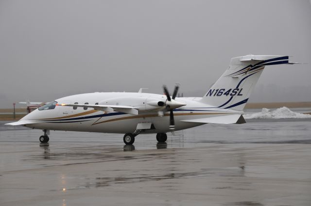 Piaggio P.180 Avanti (N164SL) - Seen at KFDK on 1/17/2010.   Heavy rain.      a href=http://discussions.flightaware.com/profile.php?mode=viewprofile&u=269247  [ concord977 profile ]/a