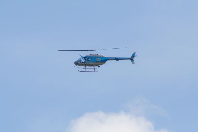 N722S — - Bell OH-58A Charleston County Sheriff Chopper flies over Charleston, S.C.