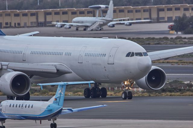 Airbus A330-200 (CS-TQW) - Look at the AWACS E3-Sentry behind...