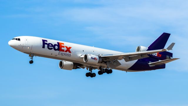 Boeing MD-11 (N618FE) - FedEx MD11 landing at PHX on 8/9/22. Taken with a Canon 850D and Rokinon 135mm f/2 lens.