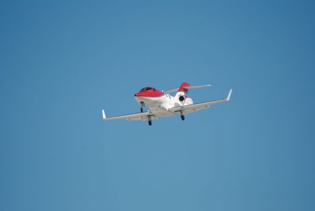 Honda HondaJet (N420AZ) - Tower Industries LLC 2015 Hondajet HA-420(CN 42000015) landing on Runway 30L at William P. Hobby Airport. 