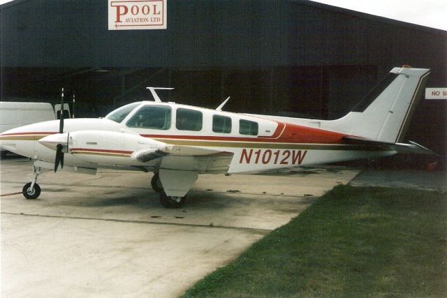 Beechcraft Baron (58) (N1012W) - Seen here in Aug-96.  Since reregistered N273TB and N64VB.