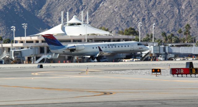 Canadair Challenger (N409SW) - Just before landing 31L at PSP on 1/22/2011