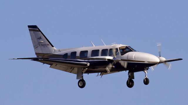 Piper Navajo (N200SJ) - Walking the dog in the Mendenhall Wetlands.  Harris Air N200SJ landing at JNU.  Im partial to this aircraft, because it is the one that brought a new puppy to me about a year ago.  Im walking that puppy today.