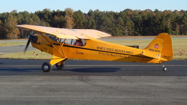 N92400 — - Greg Kootz "Farmer Act" waiting before practice demo; Warbirds Over Monroe 2017