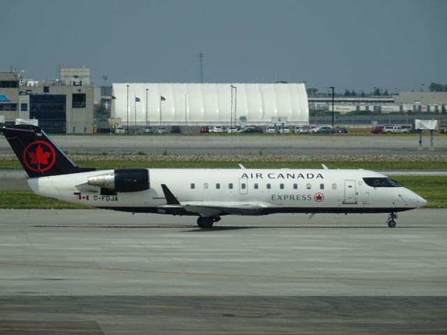 Canadair Regional Jet CRJ-200 (C-FDJA) - Taxiing to runway at CYUL