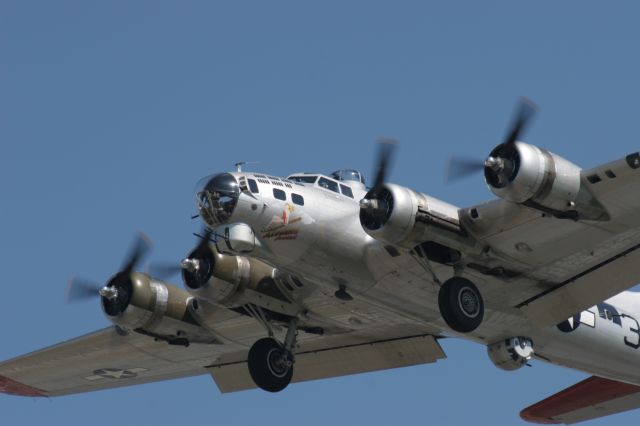 Boeing B-17 Flying Fortress — - EAA's Aluminum Overcast Lands Runway 30 Outagamie County Appleton, WI during Airventure 2012