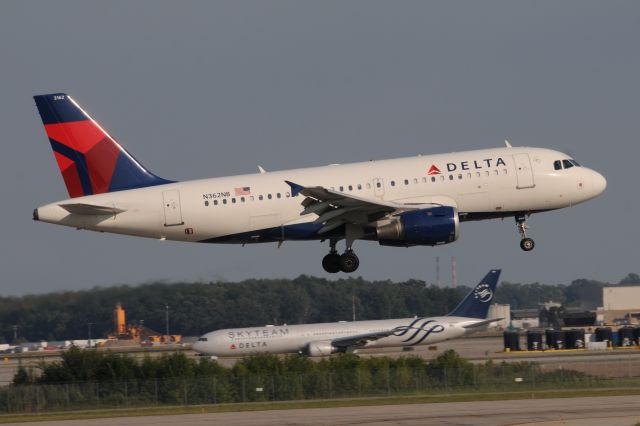 Airbus A319 (N362NB) - Delta Skyteam 767-400 in the back-ground.