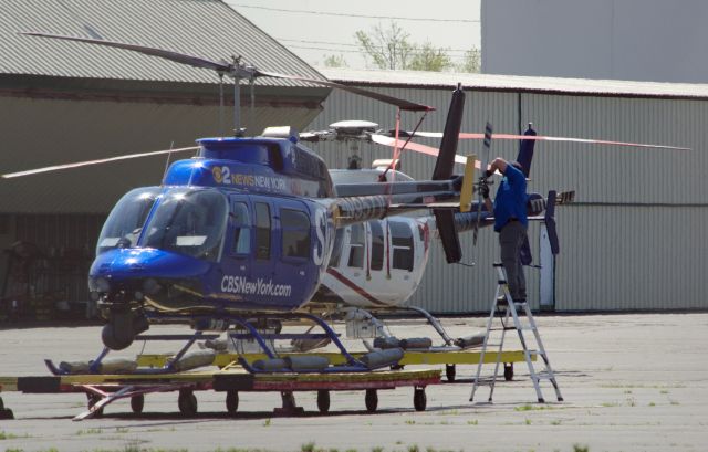 Bell JetRanger (N95TV) - LINDEN AIRPORT-LINDEN, NEW JERSEY, USA-APRIL 20, 2023: Seen by RF at 1415 hours undergoing some pre-flight maintenance was a helicopter belonging to one of the local New York City television stations.