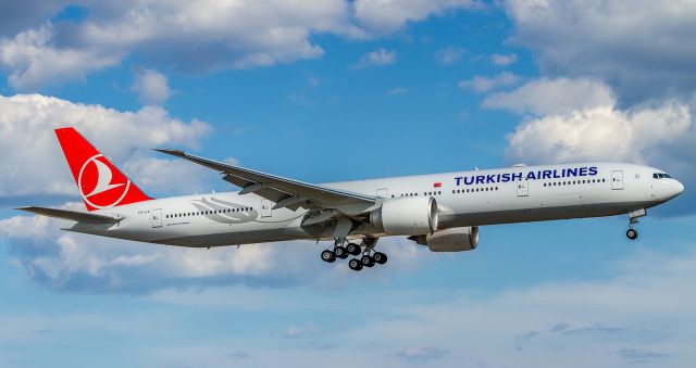 BOEING 777-300 (TC-LJI) - Second attempt at the landing. Here on short finals for runway 23 at YYZ