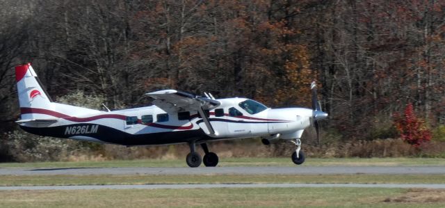 Cessna Caravan (N626LM) - Shown on departure is this "Skydive Sussex" 1998 Cessna 208B Grand Caravan heading to 14,000 feet for another Skydive deployment in the Autumn of 2024.