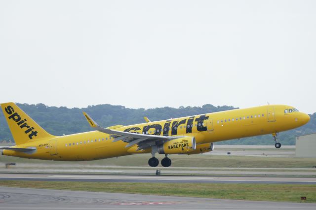 Airbus A320 (N633NK) - Departing runway 20R on a cloudy morning. 